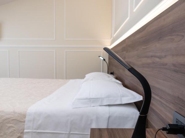 Scaligero Rooms : photo 10 de la chambre chambre double deluxe avec balcon