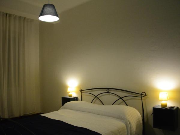Mambo Suites : photo 6 de la chambre chambre double avec salle de bains privative