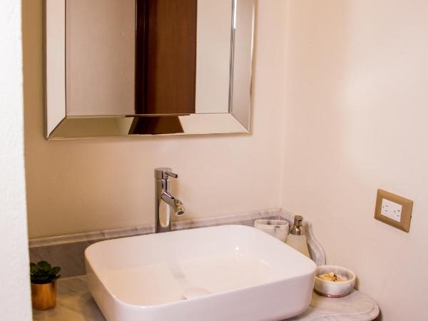 Luma B&B Boutique : photo 7 de la chambre chambre quadruple avec salle de bains