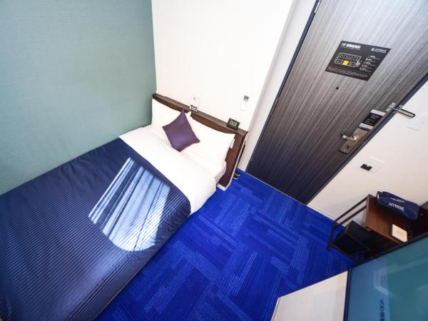 HOTEL LiVEMAX Hakataeki Minami : photo 2 de la chambre chambre double avec petit lit double - fumeurs