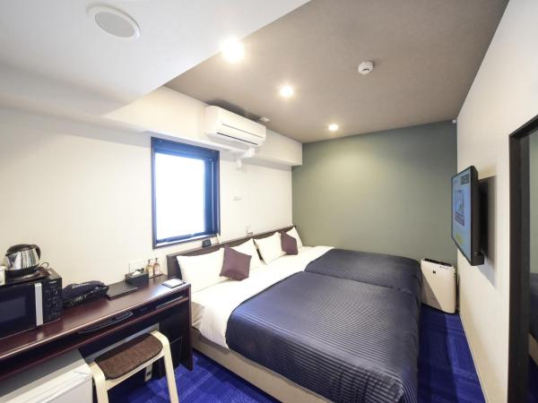 HOTEL LiVEMAX Hakataeki Minami : photo 1 de la chambre chambre lits jumeaux - fumeurs