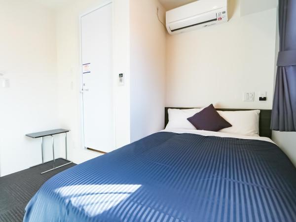 HOTEL LiVEMAX Akabane-Ekimae : photo 1 de la chambre chambre simple avec petit lit double - fumeurs