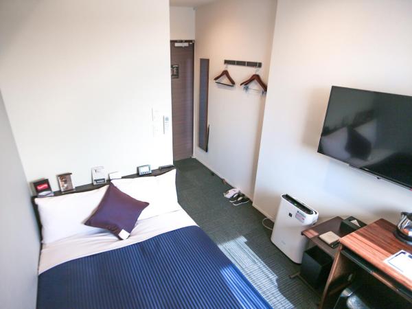 HOTEL LiVEMAX Tokyo Ayase-Ekimae : photo 1 de la chambre chambre double avec petit lit double - fumeurs