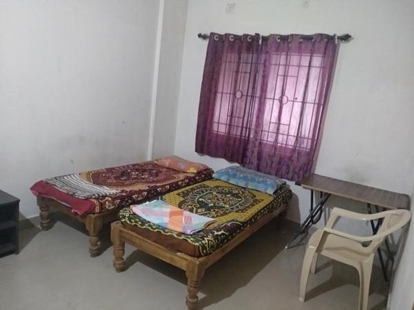 Professionals Pride PG : photo 3 de la chambre chambre double avec salle de bains commune