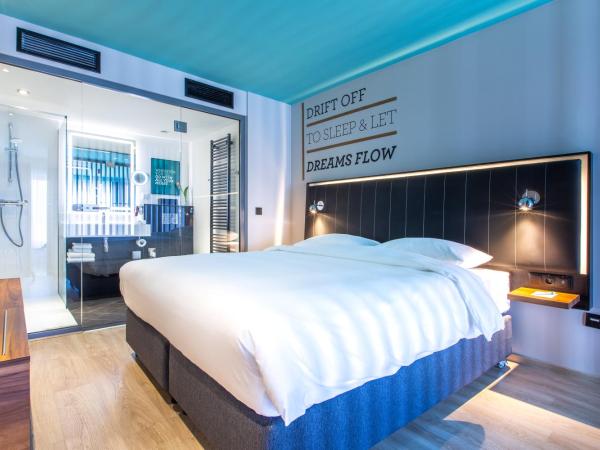 Park Inn by Radisson Poznan : photo 2 de la chambre chambre familiale