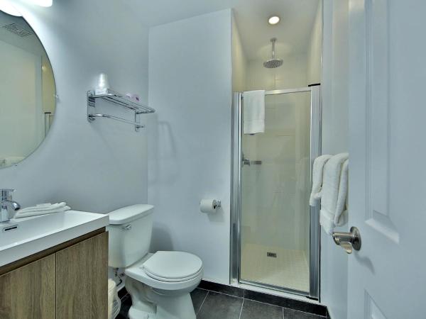 Hotel Newstar Montréal : photo 1 de la chambre chambre lit queen-size supérieure avec kitchenette