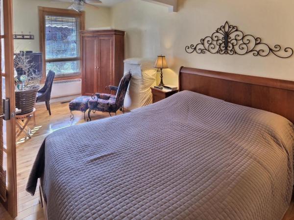 Gite Le Sieur de Joliette : photo 1 de la chambre chambre lit queen-size - keenan