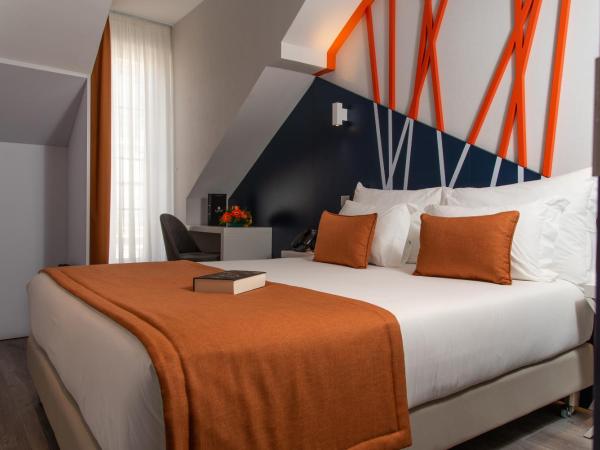 Be Poet Baixa Hotel : photo 1 de la chambre hébergement double mansarda