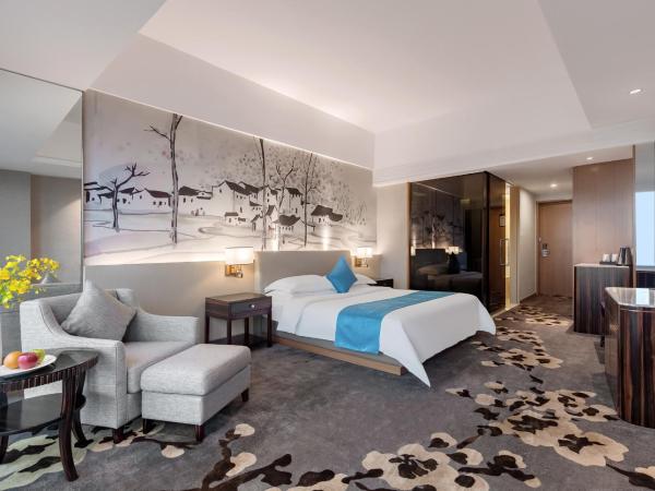 Huaqiang Plaza Hotel Shenzhen, Enjoy Complimentary Afternoon Tea & Mini Bar & Night Snack : photo 6 de la chambre chambre lit king-size deluxe