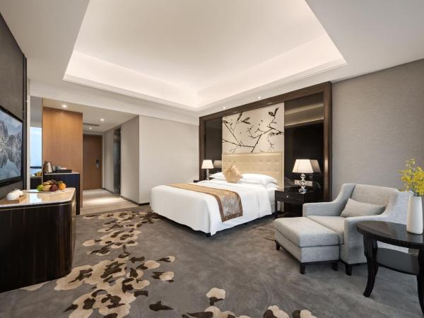 Huaqiang Plaza Hotel Shenzhen, Enjoy Complimentary Afternoon Tea & Mini Bar & Night Snack : photo 2 de la chambre chambre lit king-size exécutive avec 1 petit-déjeuner
