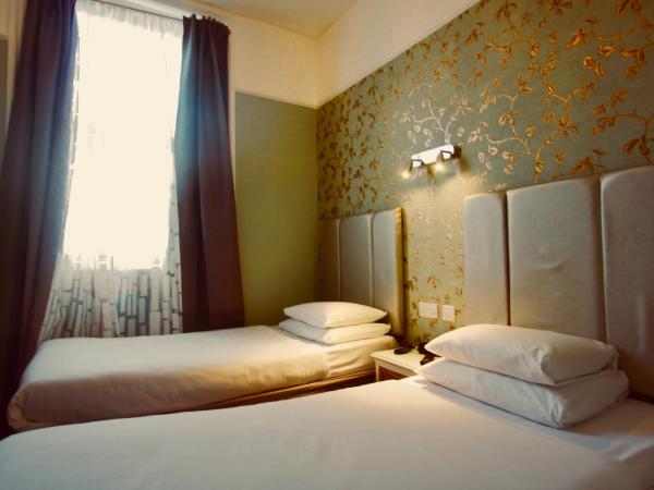 Swinton Hotel : photo 2 de la chambre chambre lits jumeaux