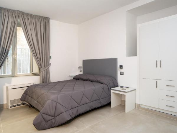 Il Tesoro Smart Suite & SPA : photo 5 de la chambre chambre double avec salle de bains privative