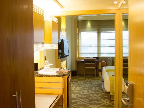 Marco Polo Hotel : photo 10 de la chambre chambre double deluxe (2 adultes + 1 enfant)