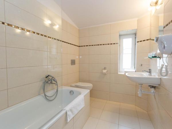 Leone Aparthotel : photo 2 de la chambre chambre quadruple