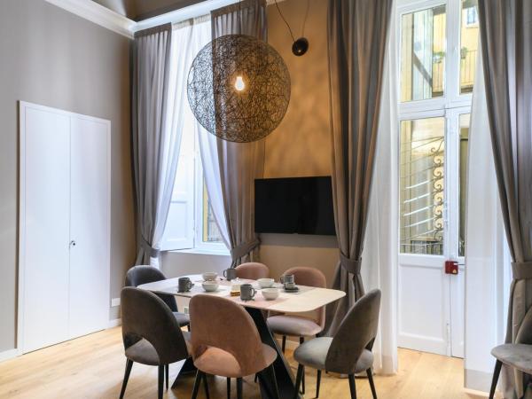 Savoia Suites Torino : photo 9 de la chambre chambre double ou lits jumeaux - vue sur jardin