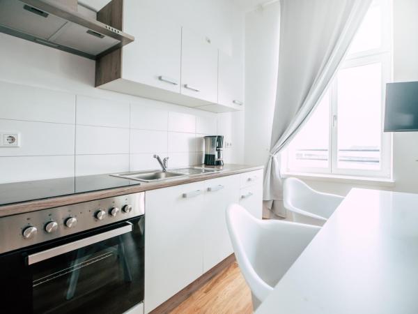 Luga Homes - Stadthaus : photo 4 de la chambre two-bedroom apartment 