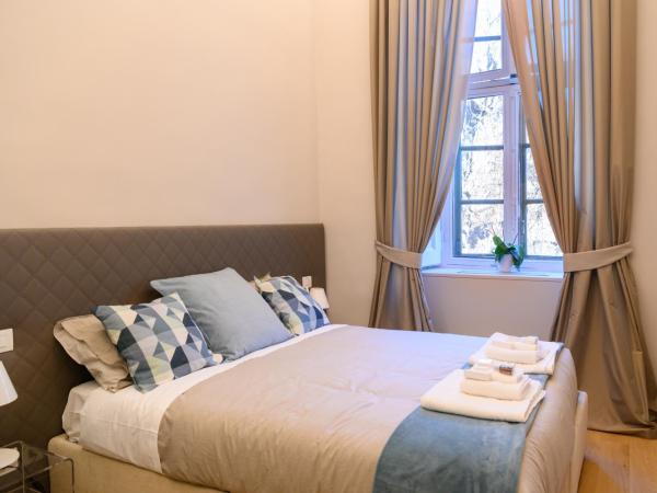 Savoia Suites Torino : photo 3 de la chambre chambre double ou lits jumeaux - vue sur jardin