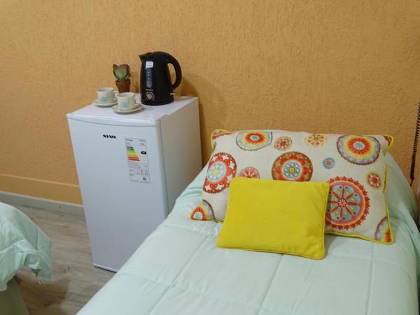 Giova Apart Salta : photo 9 de la chambre chambre familiale avec salle de bains commune