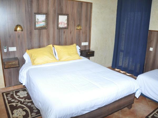 Gite Nadia : photo 3 de la chambre chambre triple supérieure