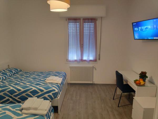 Casadei Guest House Stazione Bologna : photo 7 de la chambre chambre quadruple