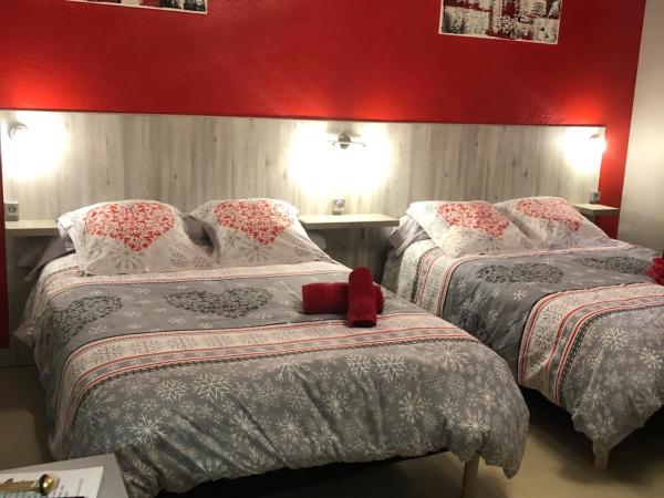 Hotel des Remparts : photo 1 de la chambre chambre quadruple