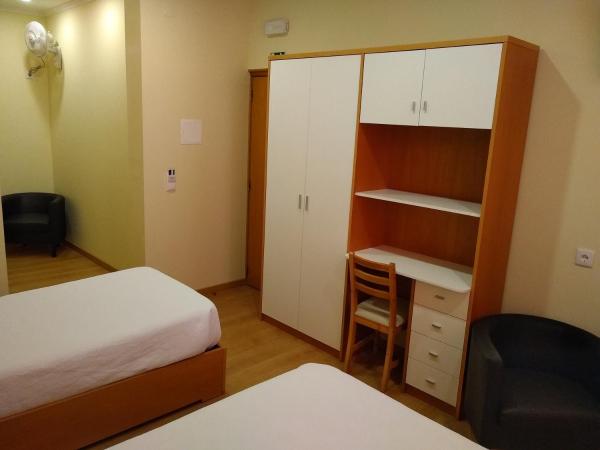 Pensao Estacao Central : photo 8 de la chambre chambre triple