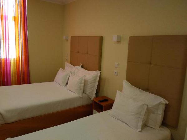 Pensao Estacao Central : photo 7 de la chambre chambre triple