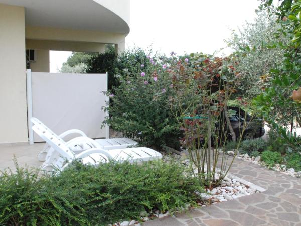 Apartmani Radin : photo 5 de la chambre chambre double - vue sur jardin