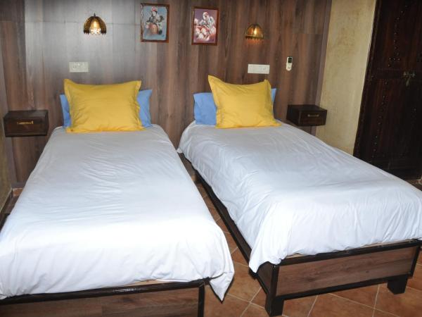 Gite Nadia : photo 3 de la chambre chambre double ou lits jumeaux - accessible aux personnes à mobilité réduite