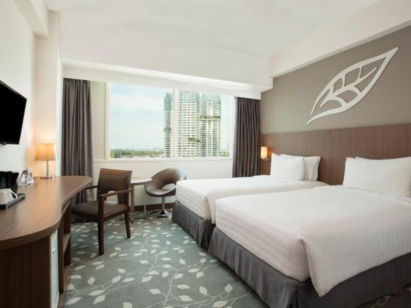 Swiss-Belinn Kemayoran : photo 3 de la chambre chambre lits jumeaux premier de luxe