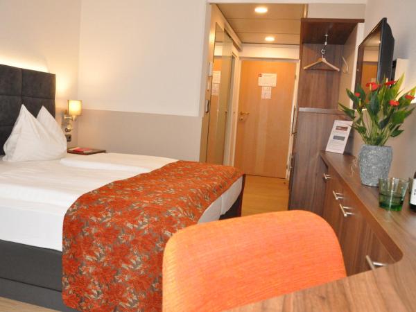 Stadtoase Kolping Hotel : photo 7 de la chambre chambre double ou lits jumeaux