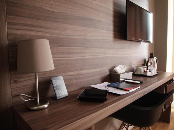 7th Floor Suite : photo 2 de la chambre chambre lit king-size supérieure