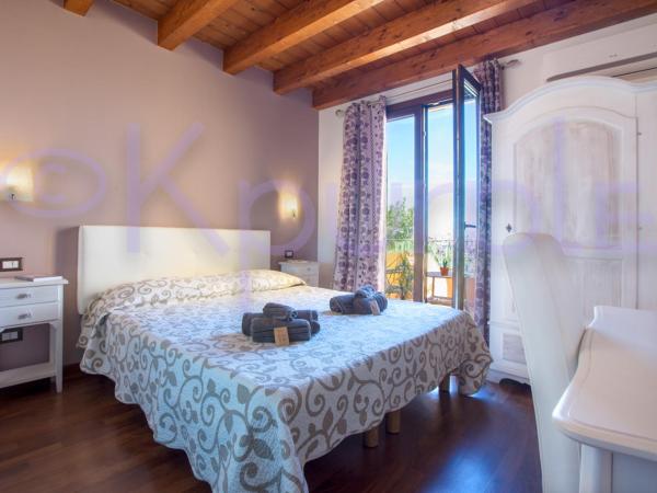 LE API : photo 7 de la chambre chambre double ou lits jumeaux standard avec balcon