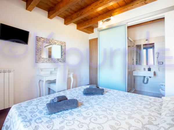 LE API : photo 8 de la chambre chambre double ou lits jumeaux standard avec balcon