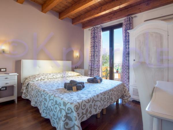 LE API : photo 9 de la chambre chambre double ou lits jumeaux standard avec balcon