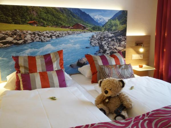 Hotel Edel Weiss : photo 5 de la chambre chambre lit queen-size 
