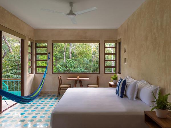 Hotel Tiki Tiki Tulum : photo 2 de la chambre suite deluxe avec lit king-size