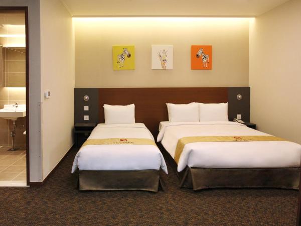 Hotel Skypark Myeongdong 2 : photo 2 de la chambre hébergement lits jumeaux deluxe récemment rénové
