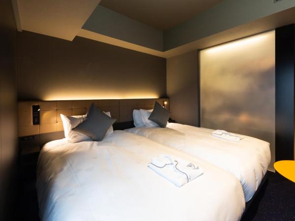 The Royal Park Canvas - Ginza 8 : photo 1 de la chambre chambre lits jumeaux standard