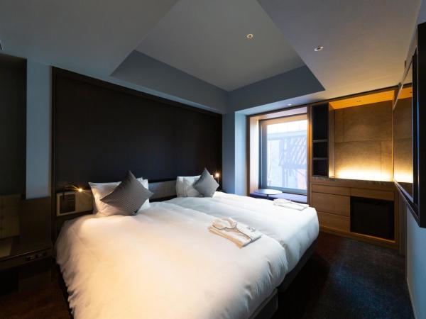 The Royal Park Canvas - Ginza 8 : photo 2 de la chambre chambre lits jumeaux supérieure