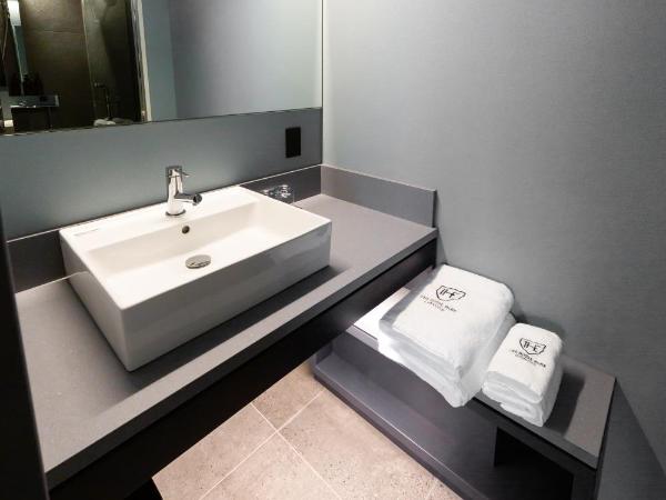 The Royal Park Canvas - Ginza 8 : photo 4 de la chambre chambre lits jumeaux supérieure