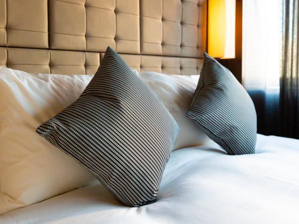 The Royal Park Canvas - Ginza 8 : photo 5 de la chambre chambre lits jumeaux supérieure