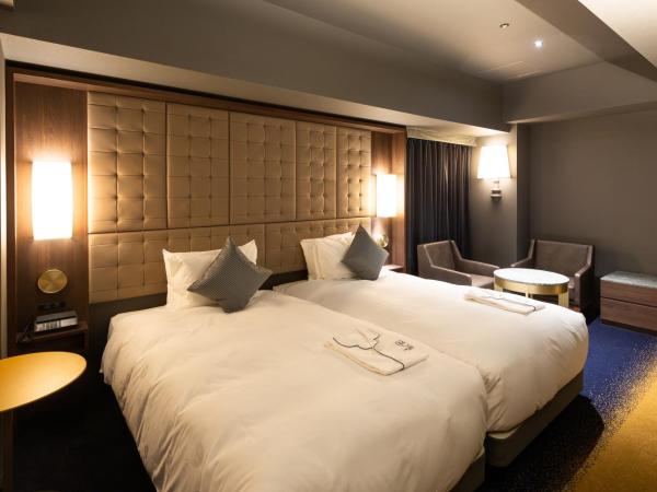 The Royal Park Canvas - Ginza 8 : photo 8 de la chambre chambre lits jumeaux deluxe