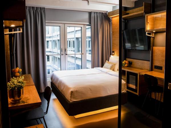 GINN Hotel Hamburg Elbspeicher : photo 5 de la chambre petite chambre double ou lits jumeaux