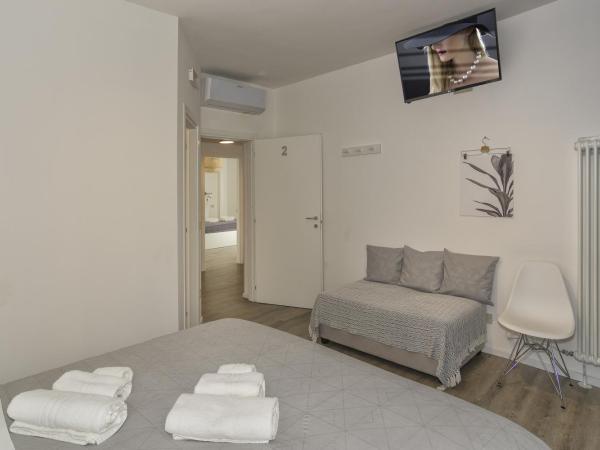 BB L'APPRODO : photo 6 de la chambre chambre double avec balcon