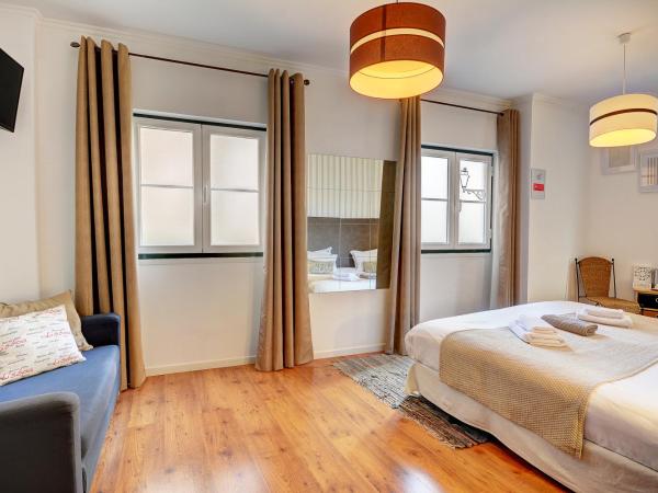 Inn Bairro Alto BA Sweet : photo 2 de la chambre chambre double ou lits jumeaux avec salle de bains commune