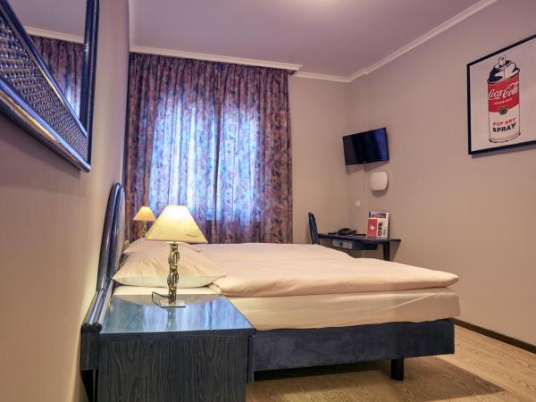 Hôtel Crystal : photo 2 de la chambre chambre lits jumeaux