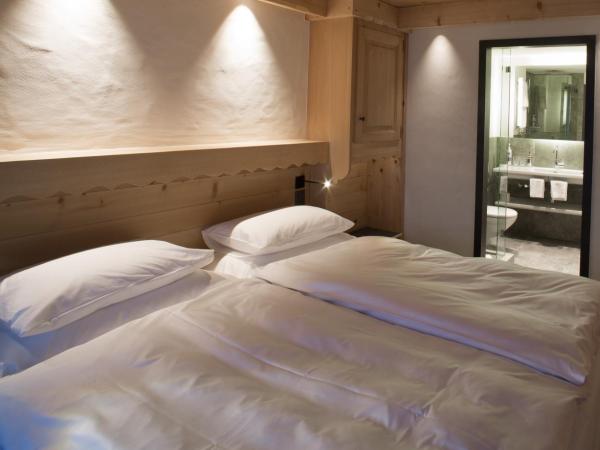 Bernerhof Swiss Quality Hotel Gstaad : photo 2 de la chambre suite 2 chambres