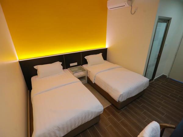 Pantai Regal Boutique Hotel : photo 1 de la chambre chambre lits jumeaux standard
