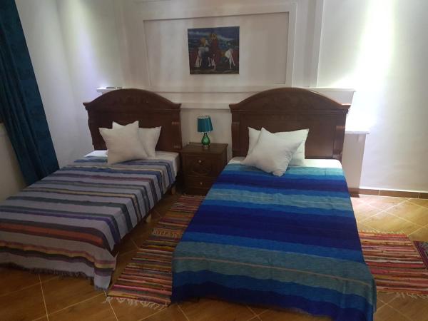 TANJITAN HOSPITALITE : photo 4 de la chambre grande chambre double 